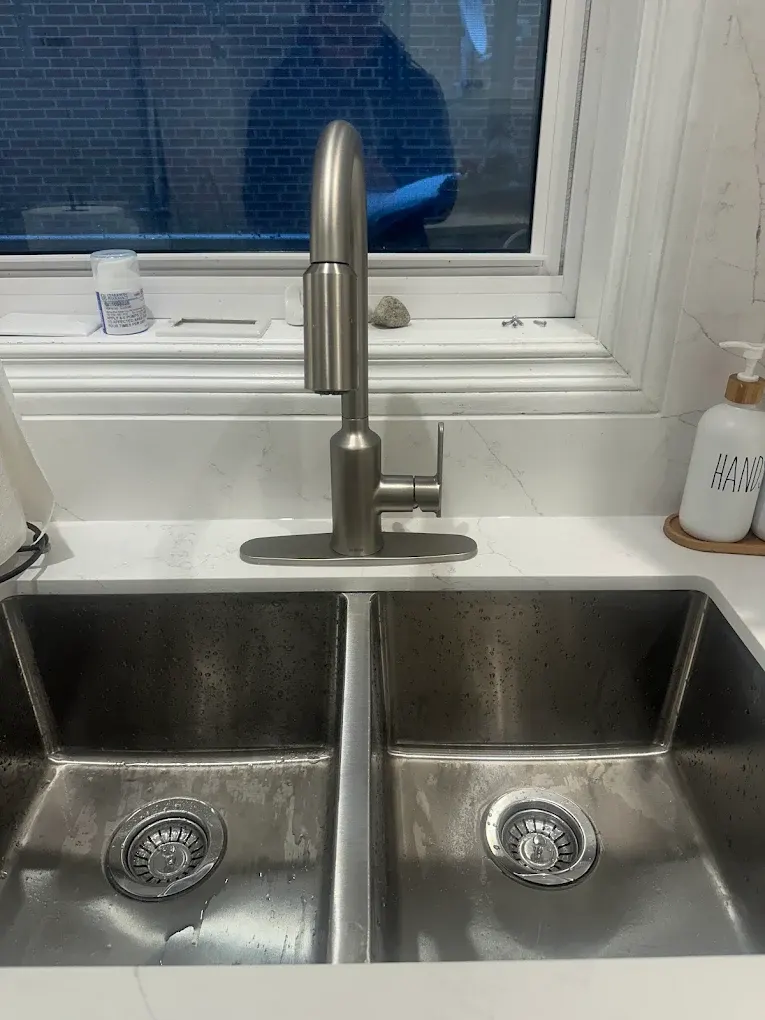 Close-up of a kitchen sink drain