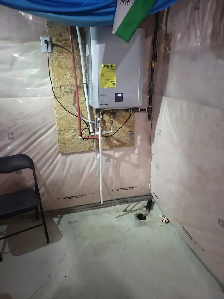 Hands working on plumbing instrumentation