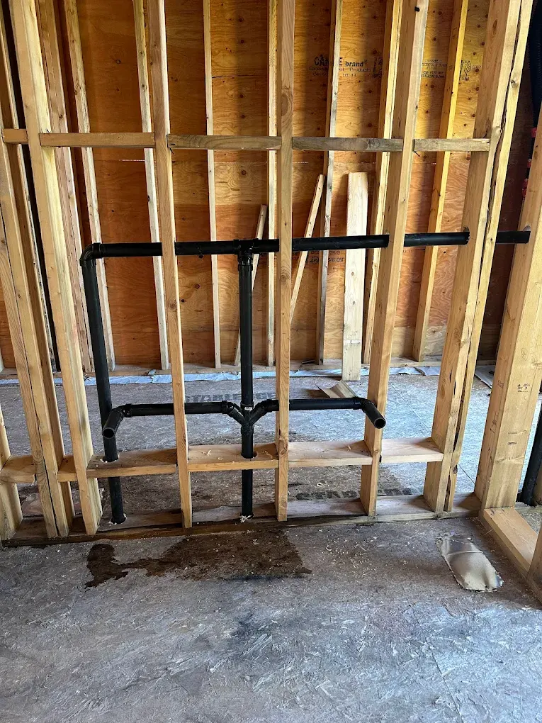 A close-up of a shut-off valve being replaced